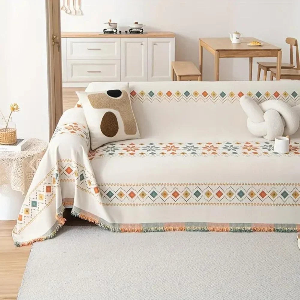 Sofaüberwurf mit Quasten
